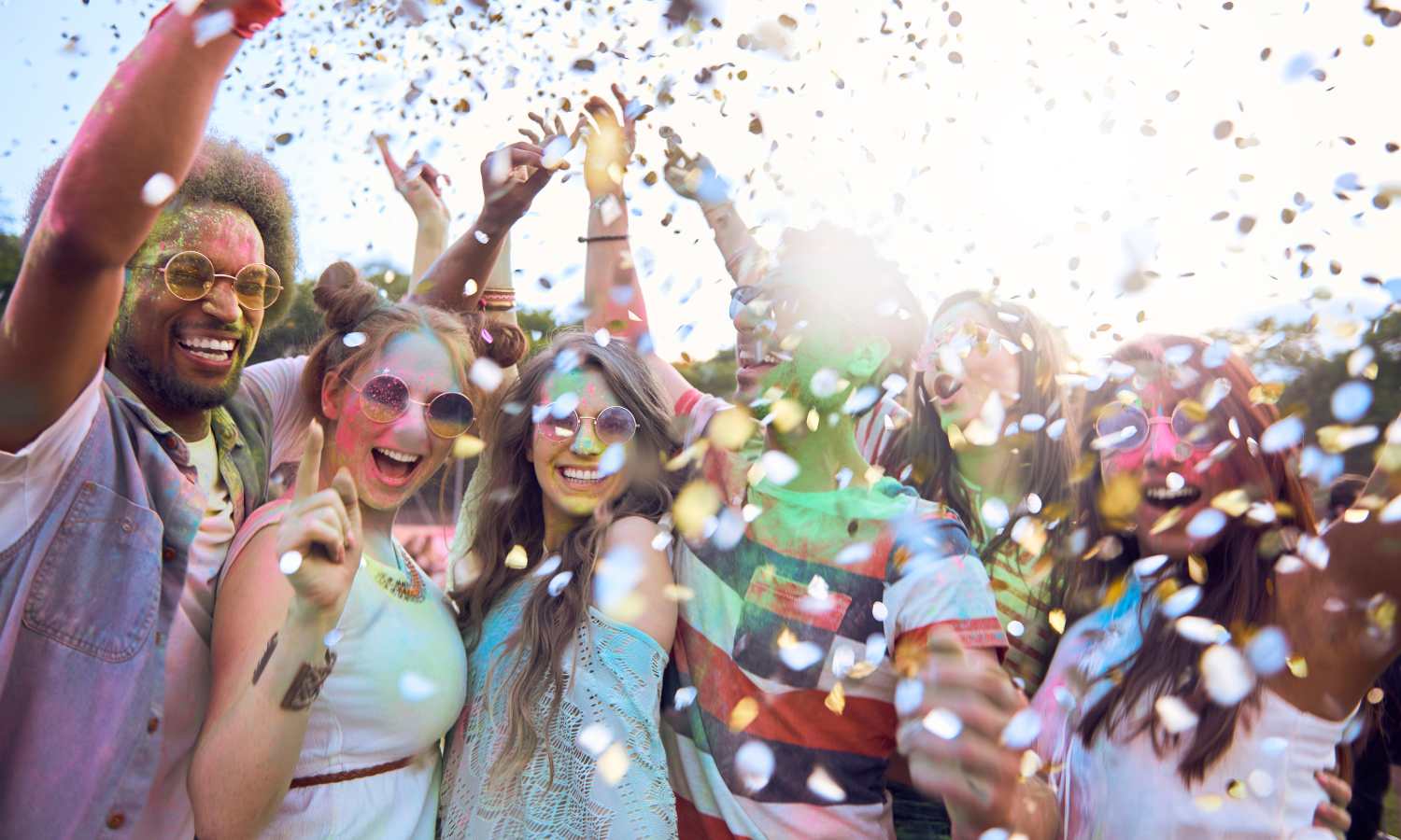 Decorative Image:  Young adults, outdoors with confetti